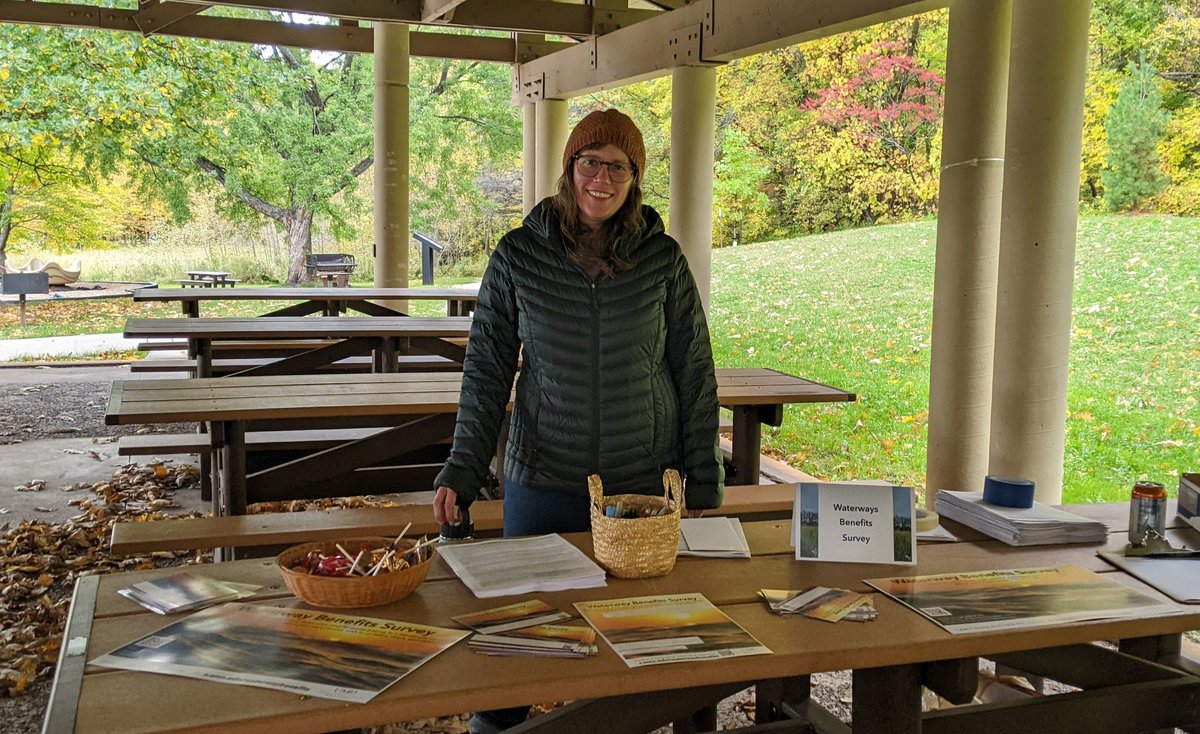Photo of Molly Wick standing at an outreach table